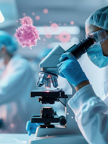 A team of researchers in an oncology lab closely examining cancer cells under a high powered microscope 